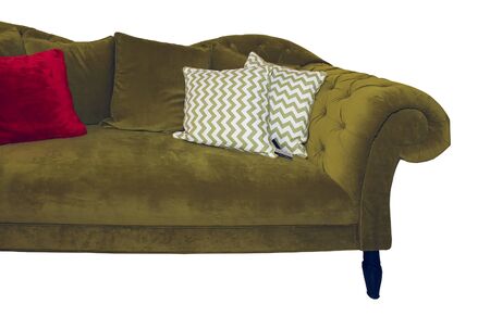 Retro green velvet half sofa furniture with decorative pillows isolated on white backgroundの写真素材