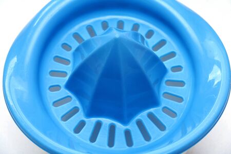 Detail of plastic juice squeezer ready for use