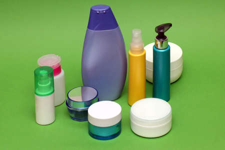 Colorful plastic and glass closed toiletries bottles beauty creams and cosmeticsの写真素材