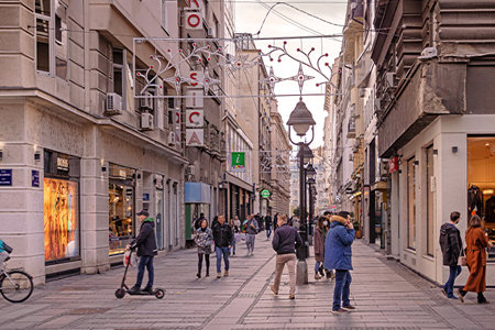 Belgrade, Serbia - November 28, 2021: Walking street Kneza Mihaila in Serbian capital Belgrade with people walking around shopping during Christmas season on a winter day.のeditorial素材
