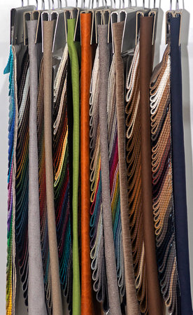 Material color samples and patterns hanging on a wallの写真素材