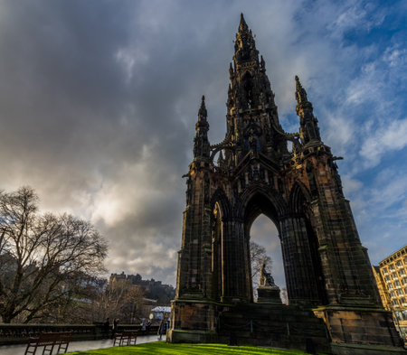 The Scott Monument for Sir Walter Scott with Edinburgh Castle on the background at Princess Street gardens in Edinburgh, Scotlandのeditorial素材