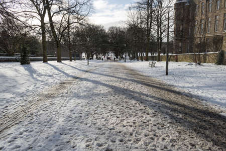 The meadows a public park during the winter covered by snow in Edinburgh, Scotlandの写真素材