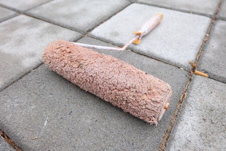 Paint roller on groundの素材