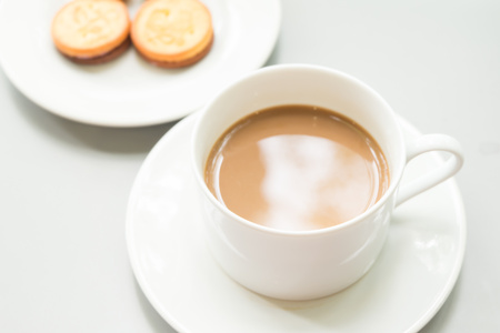 coffee cup on table window sideの写真素材
