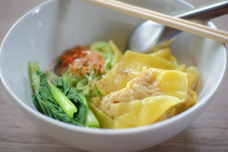dried egg noodles and dumpling chinese foodの写真素材