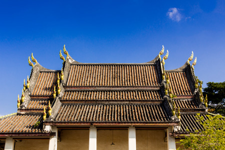 The roof of the old church inside the temple in Thailand.の写真素材