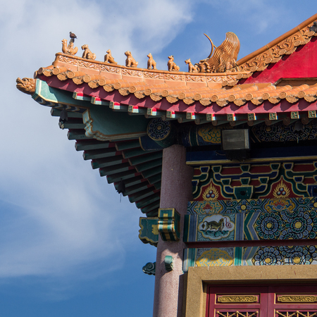Details of a roof from chinese building in Bangkok , Thailand.