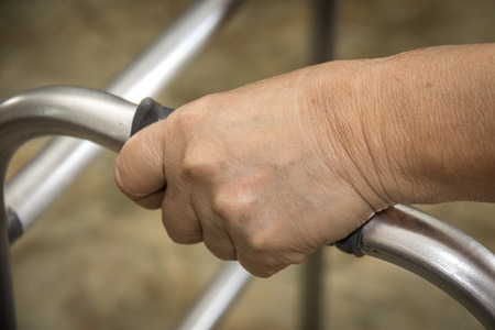 Hand of senior woman on a walker.の写真素材