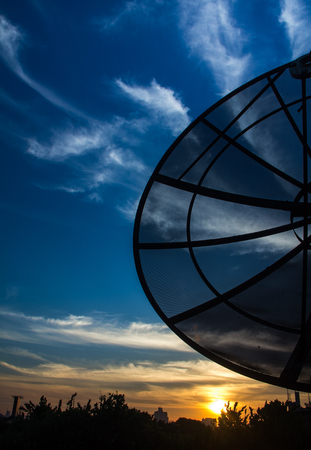 Satellite dish on the building in morning.の写真素材