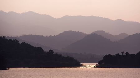 The evening light in winter at the lake.の写真素材