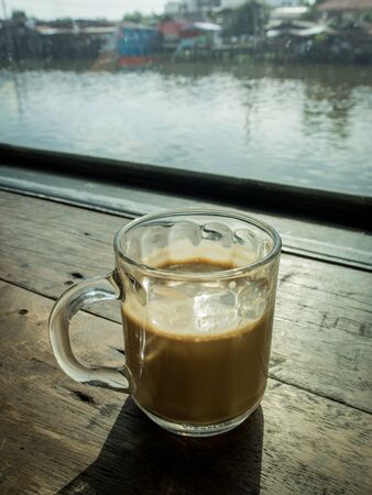 Cup of coffee on the wooden tableの写真素材