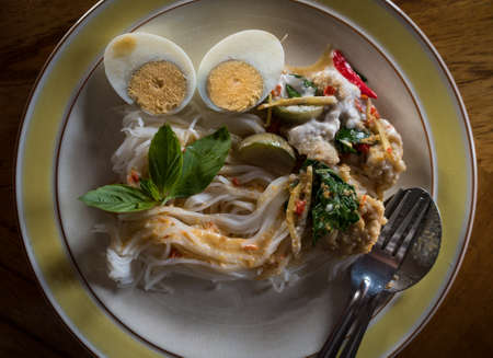 Thai appetizer pork satay with bread and peanut sauce.の写真素材