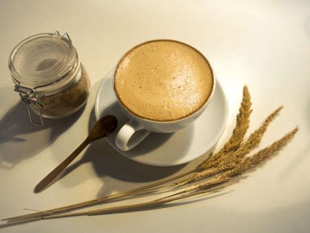 Hot coffee in the ceramic cup on the table.の写真素材