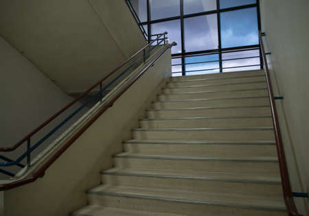 A concrete fire escape in the high building.の写真素材