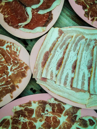 Raw pork and raw beef preparing for to grill.の写真素材