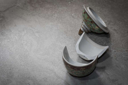 The benjarong porcelain was damaged on the granite floor.の写真素材