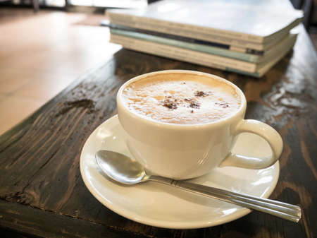 Hot coffee in the ceramic cup on the table.の写真素材