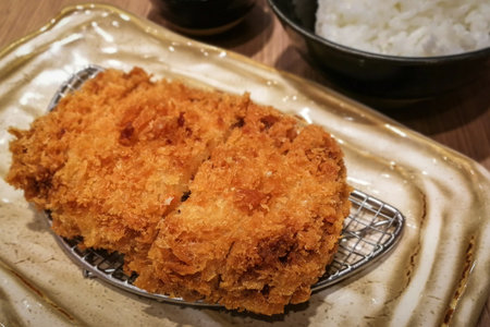 Fried chicken with rice, salad and kimchiの写真素材