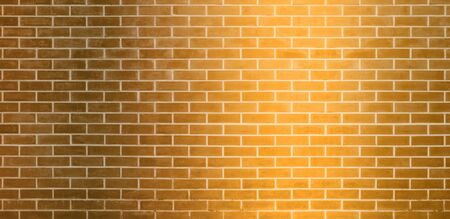 Brick wall, Golden yellow bricks wall texture background for graphic designの写真素材