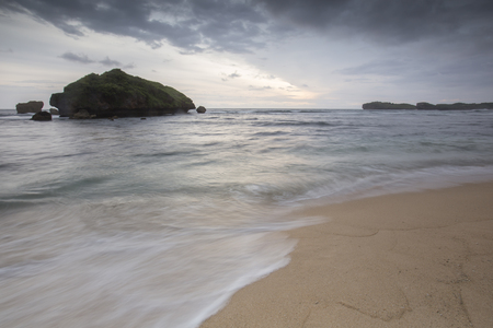Scenic view of Ngandong Beach, Gunungkidul, Yogyakartaの写真素材