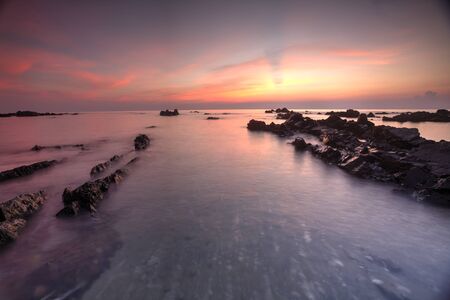 PANDAK BEACH, 25 JULY 2015. Sunrise seascape at Pandak Beach, Terengganu.の写真素材