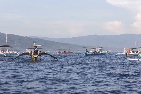 Lovina Beach, Bali, known as dolphin beach as it can been seen naturally using boat.の写真素材