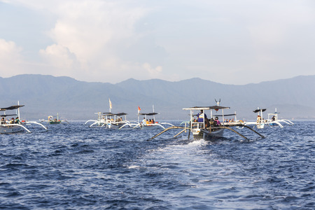 Lovina Beach, Bali, known as dolphin beach as it can been seen naturally using boat.の写真素材
