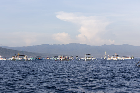 Lovina Beach, Bali, known as dolphin beach as it can been seen naturally using boat.の写真素材