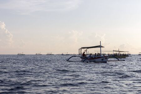 Lovina Beach, Bali, known as dolphin beach as it can been seen naturally using boat.の写真素材