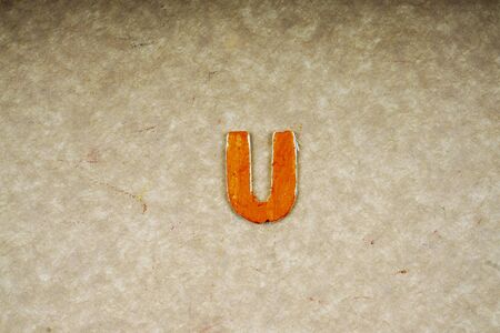 Alphabets isolated on wooden board.の写真素材