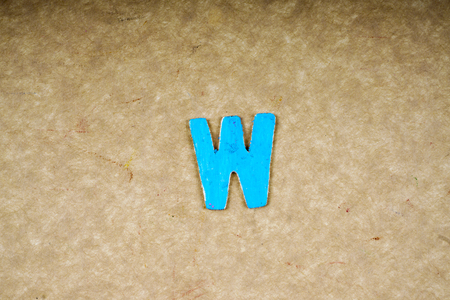 Alphabets isolated on wooden board.の写真素材
