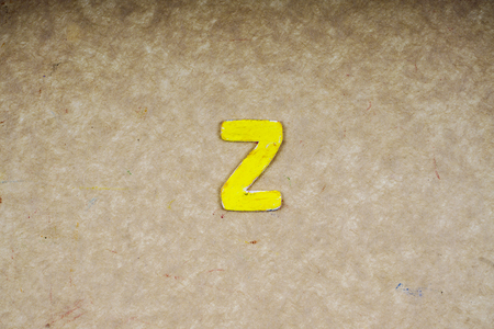 Alphabets isolated on wooden board.の写真素材