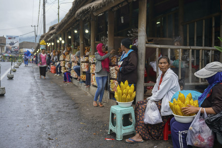 Unidentified street seller in Kintamani, Bali, Indonesia selling their agriculture products.
