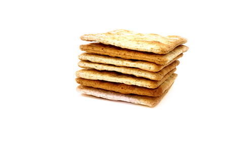 Cream cracker biscuits isolated on white.の写真素材