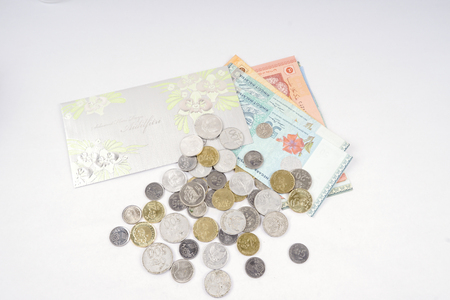 Coins and notes on table. Saving and business concept.