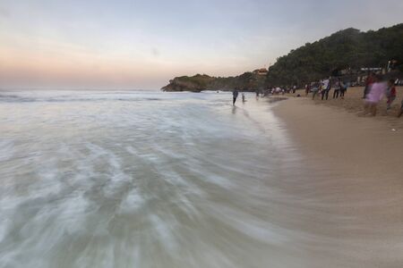 Amazing view of Yogyakarta seascape with natural coastal rock as foreground