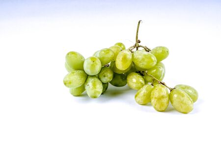 Green grape isolated on white backgroundの写真素材