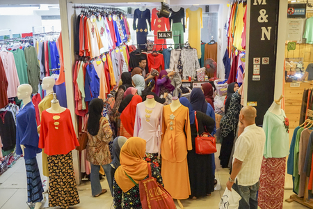 KUALA LUMPUR: JULY 11, 2016 - Kenanga shooping wall  with some people in itのeditorial素材