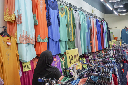 KUALA LUMPUR: JULY 11, 2016 - Kenanga shooping wall  with some people in itのeditorial素材