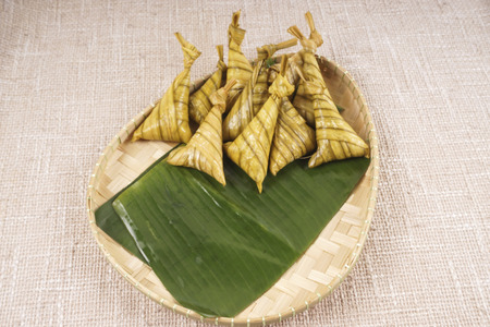 Famous traditional Malay foods during Ramadhan, Eid Fitr and Eid Adha i.e. of lemang (bamboo rice) ,ketupat (dumpling rice in coconut leaf) dan rendang beef. DOF and copyの写真素材