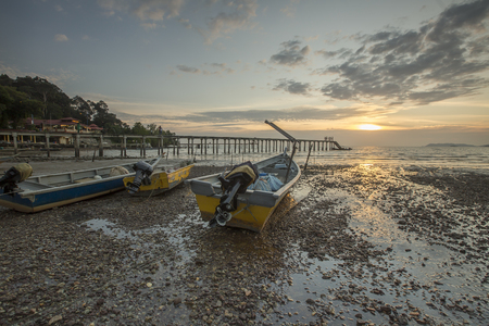 A beautiful Sunset seen the fishing boatのeditorial素材