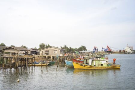 KLANG, MALAYSIA - FEBRUARY 08,2016 : Traditioal wooden fisherman boats park at the jetty.のeditorial素材
