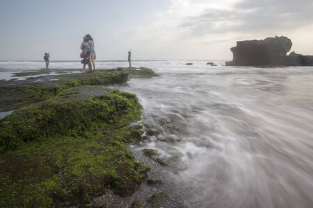Cloudy Sunset at Pura Batu Bolong in Tanah Lot sunset in Bali, Indonesiaのeditorial素材