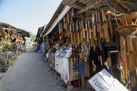 Souvenier shop at Pura Batu Bolong in Tanah Lot sunset in Bali, Indonesiaのeditorial素材