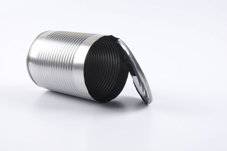 Empty oped aluminum can isolated on white.の写真素材