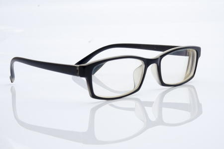 black glasses isolated on white backgroundの写真素材