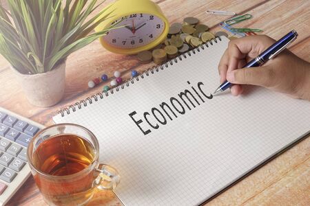 Man writing PAYROLL on the notepad.Business conceptの写真素材