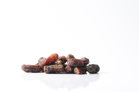 Date fruits on white background. Selective focus.の写真素材