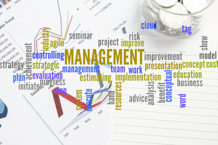 Project management with office stationery  around the word cloud. Analysis and planning keywords.の写真素材